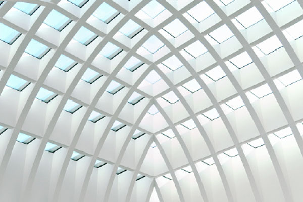 An image of a vaulted ceiling with geometric skylights.