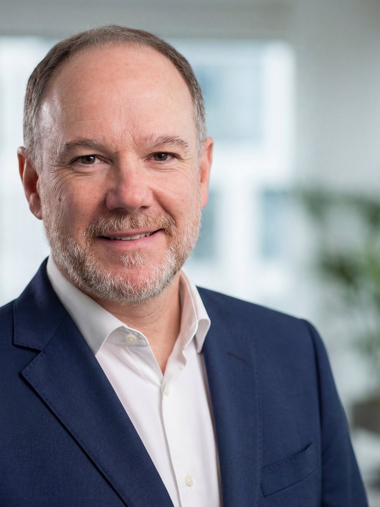 Jörg Allemann, IT Director (CIO) of the Zehnder Group, in a bright office